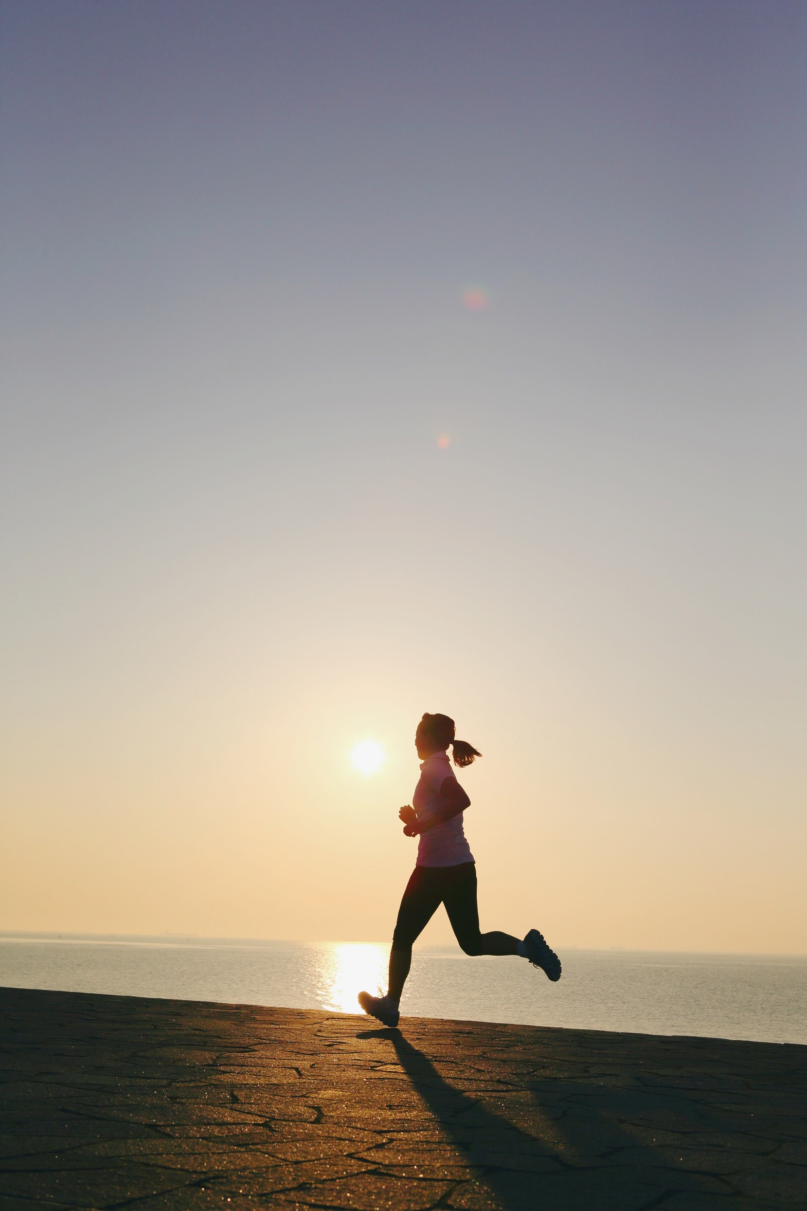 Runner along the Florida Gulf Coast at sunrise
